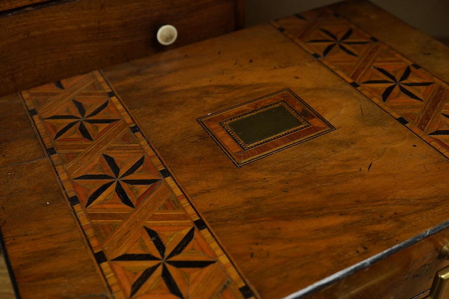 A small 19th century mahogany chest of three drawers having bone handles, width 26cm, height 26cm and a Victorian parquetry banded box, largest 26cm high. Condition - fair